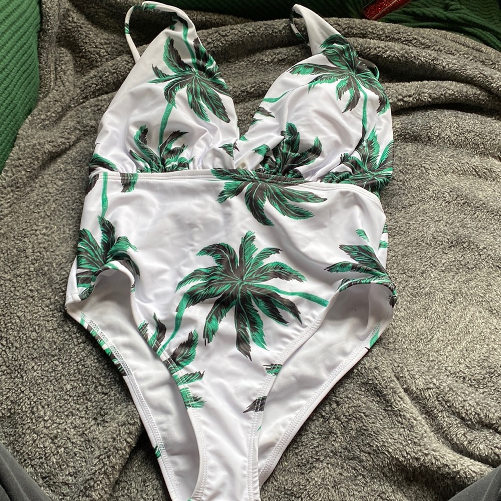 Green and white palm tree bathing suit